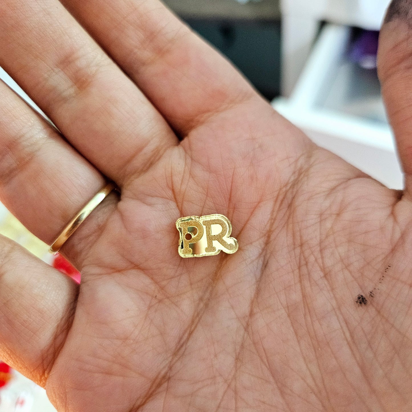 PR mini charm